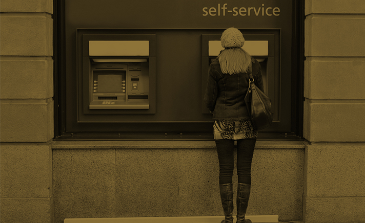 girl withdrawing money from an ATM