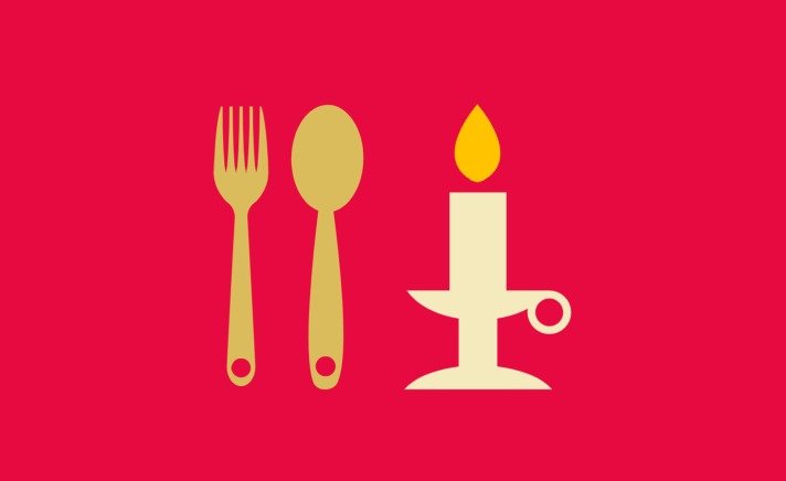 A fork, spoon and candle stick