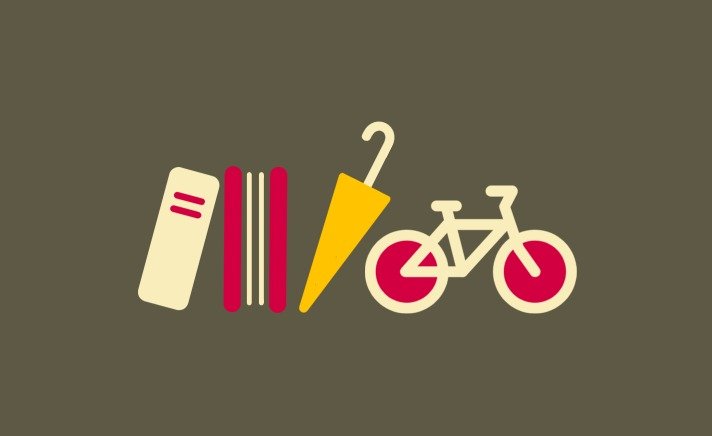 A bicycle, umbrella and books