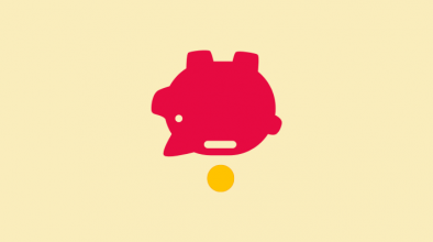 upside down piggy bank with coin
