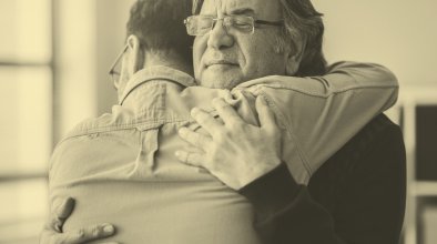 two men hugging